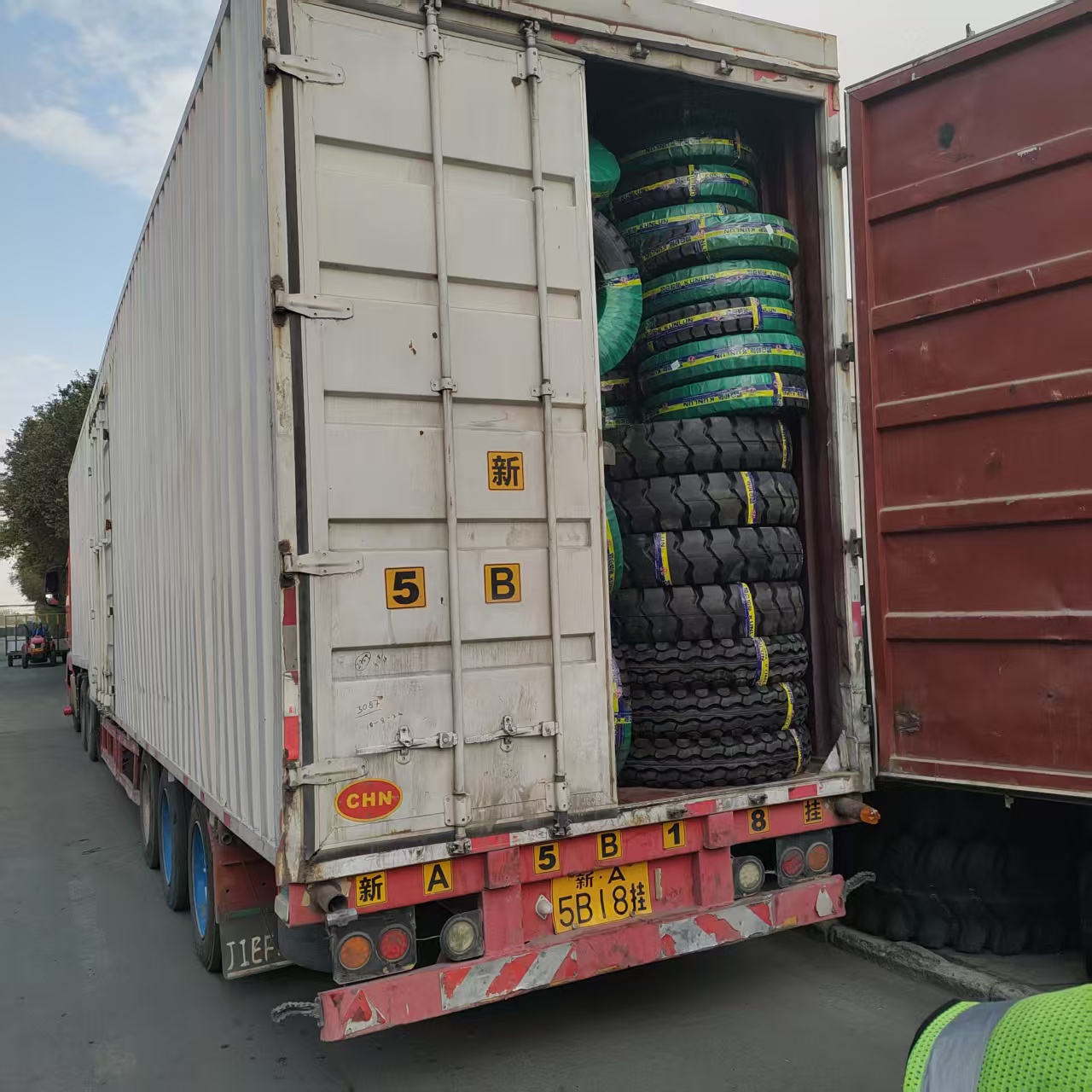 Truck tires loaded into a shipping container